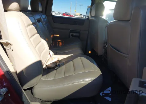 2003 Hummer H2 z USA, uszkodzony, nr VIN 5GRGN23U23H118677